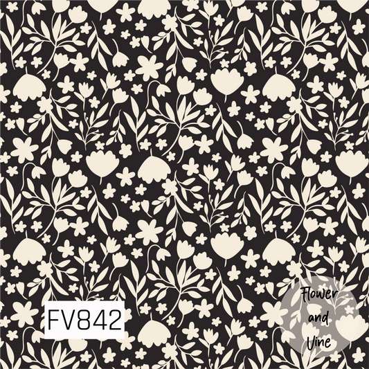 A charming floral print featuring an assortment of cream-colored flowers, leafy sprigs, and delicate stems scattered across a rich black background. The simple silhouette-style florals create a bold contrast while keeping the design soft, whimsical, and timeless.
