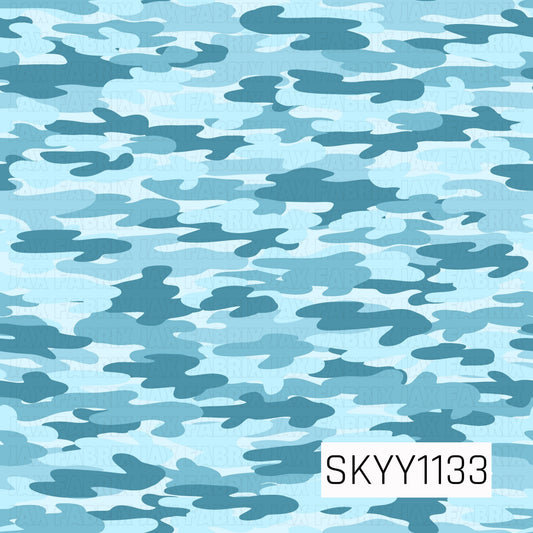 A classic camouflage pattern featuring layered organic shapes in a cool blue palette. Shades of deep teal blue, dusty blue, aqua, and pale icy blue create a bold camo look with a fresh, playful twist.
