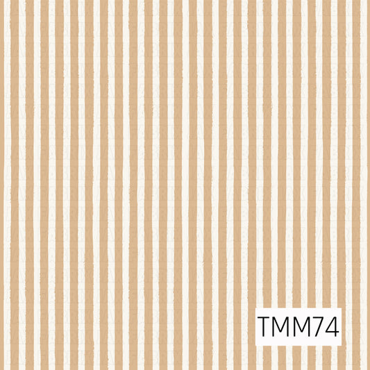 A soft hand-painted vertical stripe pattern featuring warm sandy beige lines on a creamy ivory background. The slightly uneven watercolor-style edges give it a relaxed, handmade feel that works beautifully as a subtle coordinate for florals, plaids, patchwork designs, and other earthy prints.
