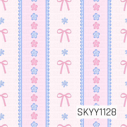 A sweet feminine seamless pattern featuring delicate pink bows, tiny blue floral accents, and vertical bands of alternating pink and blue flowers. Scalloped blue edging adds a dainty lace-inspired detail against the soft blush pink background.
