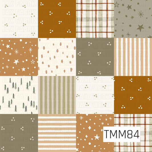 A cozy patchwork pattern featuring a mix of watercolor plaid, stripes, tiny florals, scattered pine trees, speckled prints, and whimsical star accents. Warm mustard, muted olive green, tan, brown, and cream create an earthy vintage-inspired color palette.
