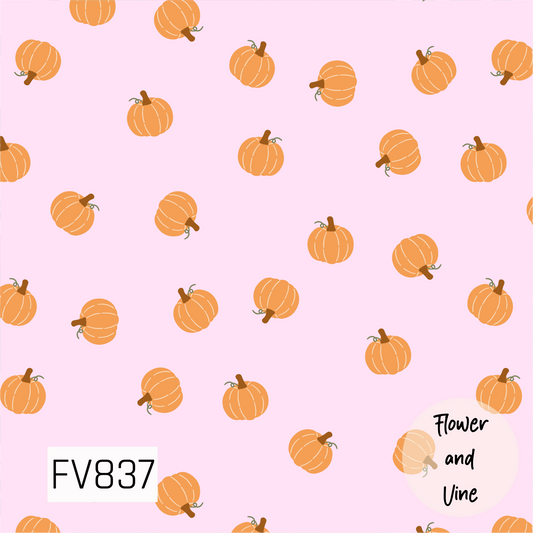 A playful fall print featuring cheerful orange pumpkins scattered across a soft pastel pink background. Each pumpkin has simple cream detailing, warm brown stems, and tiny green vines for a sweet hand-drawn look. The unexpected pink and orange color combination gives this classic autumn design a fun, feminine twist.
