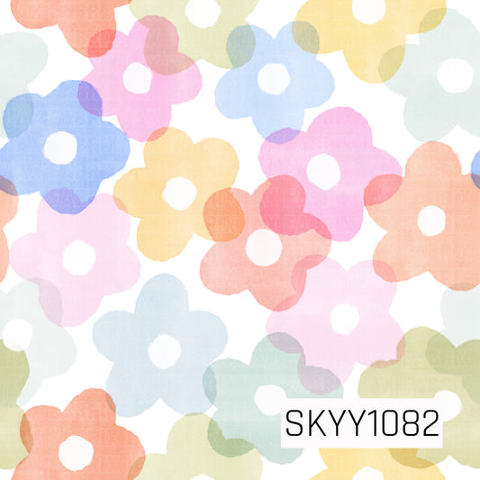 Soft watercolor flowers in pastel shades of pink, blue, yellow, coral, and mint bloom across a crisp white background. The dreamy, hand-painted style creates a bright, cheerful design with a playful springtime feel.
