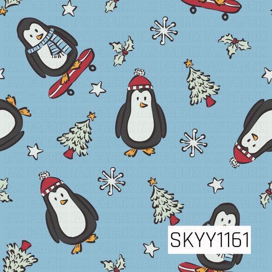 A playful winter pattern featuring adorable penguins dressed in cozy hats and scarves, with some riding red sleds. Snowflakes, snowy Christmas trees, holly, and scattered stars fill the soft blue background for a fun, whimsical holiday feel.