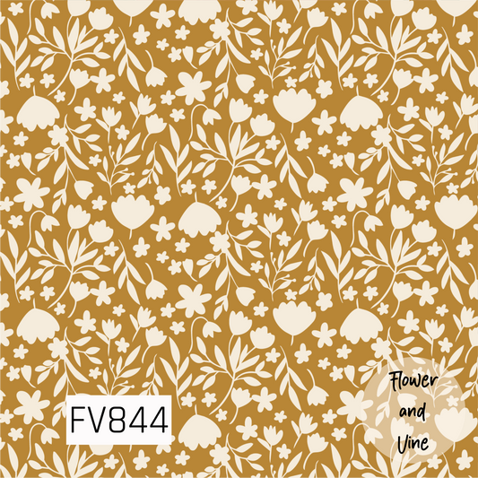 A warm botanical print featuring cream flowers, leafy branches, and delicate floral sprigs scattered across a rich mustard gold background. The simple silhouette-style florals give the design a cozy, vintage-inspired feel that is perfect for fall while still being versatile enough for year-round use.
